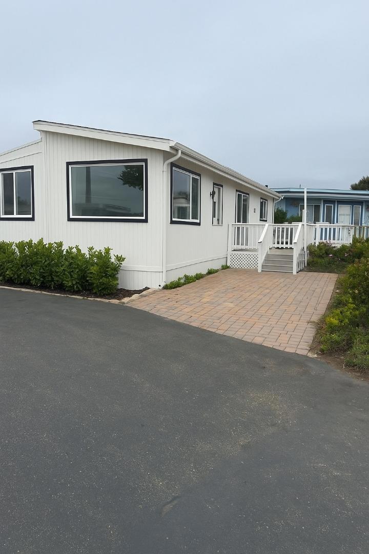 Incredible sweeping ocean views from this bluff front, 2-bedroom Mobile Home in the Surf and Sand Mobile Home Park. Just a short walk to the shops, restaurant's or the beach! Laminate floors throughout, dual pane windows, updated kitchen and bath. Large yard and deck to enjoy the spectacular views while you putter in your garden.