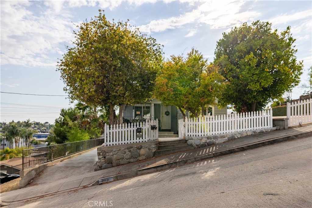 This rare opportunity in the Garvanza neighborhood is ideal for multi-generational living, rental income, or a smart investment. Located at 329 Marie Ave, this charming 1-bedroom, 1-bathroom bungalow showcases original character throughout, complemented by thoughtful upgrades including newer kitchen cabinets and leased solar. Nestled on a quiet residential street, the home offers stunning canyon views, along with sights of Pasadena, City Hall, and fireworks from Dodger Stadium and the Rose Bowl. The neighborhood is evolving with new life and families, adding vibrancy to this already desirable community. Just minutes from parks, schools, and the popular shops and restaurants on York Boulevard, this is a truly unique opportunity to own in one of Northeast LA’s most sought-after areas.