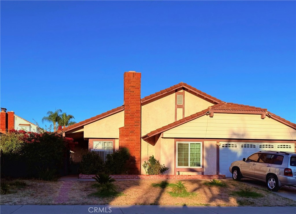 Welcome to this beautifully single-story home nestled in a quiet, well-established neighborhood just minutes from the market, local parks, schools, and with easy access to the 60 Freeway just minutes away via Perris Blvd. This spacious 4 bedroom home with a bonus room and 2 bathrooms perfectly blends functionality, charm, and energy efficiency, featuring a solar system. Low taxes and no HOA make this home an even smarter investment. Inside, you'll find a cozy fireplace in the living room, a spacious family room for relaxing or gathering, and an upgraded kitchen. The dining area is ideal for hosting family meals, while high ceilings and abundant natural light create a bright, airy atmosphere throughout. Step outside to a fully landscaped backyard with fruit trees, a covered patio for dining or enjoying the outdoors, and a fenced yard with a dog run. Whether you're dreaming of cozy nights by the fire, sunny afternoons in the garden, or making lifelong memories with loved ones, this loving home offers the perfect blend of comfort, peace, and everyday living. Within walking or a short drive, you’ll find Bear Valley Elementary, Mountain View Middle School, and Valley View High School. Convenience is key with popular dining options nearby including Sizzler, Black Bear Diner, Denny’s, Bambino’s Pizza, Juan Pollo, Shakey’s Pizza, John’s Incredible Pizza, Olive Garden, Chili’s, and more, plus essentials at Cardenas Market, Sprouts, Target, CVS, Walgreens, AutoZone, and O’Reilly Auto Parts just minutes away. For entertainment, enjoy family fun at Harkins Moreno Valley 16, Round1 Bowling & Entertainment, and Regency Theatres. Outdoor lovers will appreciate nearby hiking trails perfect for weekend adventures. Fitness enthusiasts will also appreciate proximity to LA Fitness, EoS Fitness, and 24 Hour Fitness. With easy access to the 60 Freeway, nearby banks such as Chase, SchoolsFirst Credit Union, Altura Credit Union and community amenities including parks, walking trails, and seasonal events like MoVal Rocks! concerts and outdoor movies, this home offers the perfect blend of comfort, convenience, and lifestyle. Outdoor enthusiasts will appreciate easy access to the expansive Lake Perris State Recreation Area offering hiking, fishing, boating, and camping just a short drive away.