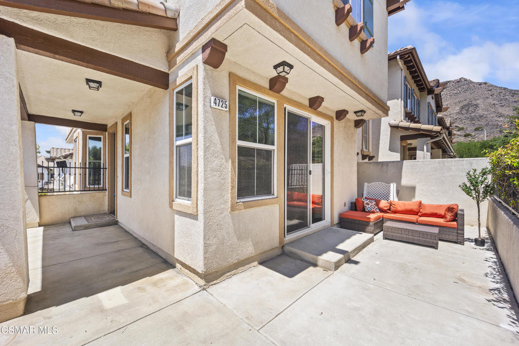 Fully remodeled and one of the largest floor plans in the community, this highly sought-after end-unit Dos Vientos townhome is filled with natural light from abundant windows. Nestled in the quiet, private Aldea enclave, scenic hills surround it, the Santa Monica Mountains, and award-winning schools--perfect for year-round outdoor living with nearby hiking, biking, and parks.Inside, the bright open layout features brand-new premium vinyl flooring, fresh paint, and an upgraded kitchen with quartz counters, stainless steel appliances, a large center island, and under-cabinet lighting. The living room offers a cozy gas fireplace and built-in speakers, while the direct-access 3-car garage provides ample storage.All bathrooms have been beautifully renovated with new backsplashes, modern sinks, and stylish finishes. Upstairs, spacious bedrooms include a sun-filled primary suite with a walk-in closet and spa-like en-suite bath.The community offers two pools and spas with panoramic views, and is close to Sycamore Canyon School, parks, and sports courts.An ideal home for those who value modern upgrades, nature, and an active lifestyle.