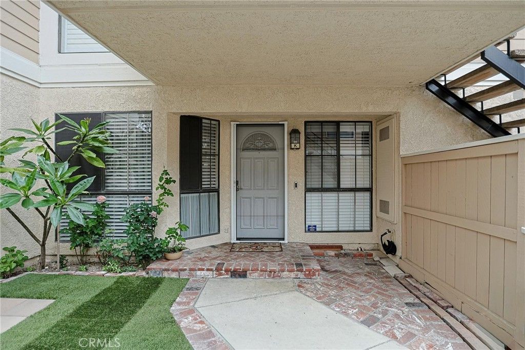 Photo of 12635 Briarglen Loop LOOP #K, Stanton, CA 90680 (MLS # OC26108786)