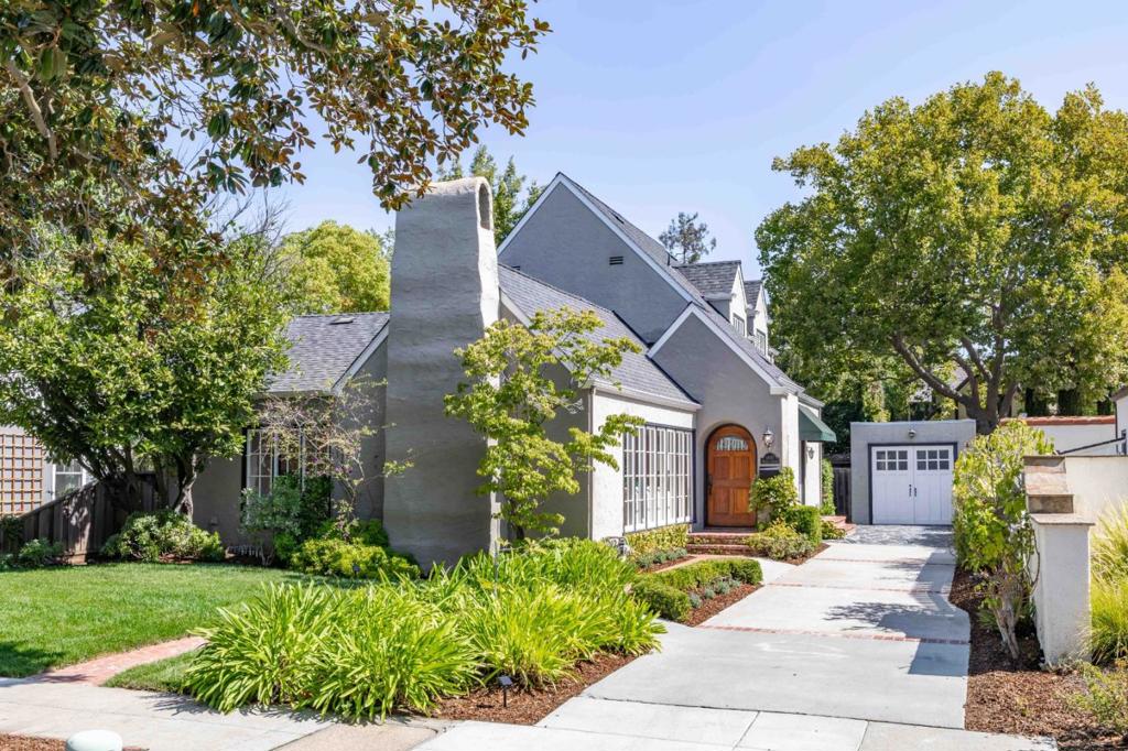 Set on a peaceful, tree-lined street, this charming home welcomes you with a brick pathway through landscaped grounds. Over 2,400 square feet span two levels filled with natural light, hardwood floors, and crown molding. The enormous living room centers on a spectacular fireplace and flows to the formal dining room, while the chef's kitchen is outfitted with top appliances. Four bedrooms include the inviting primary suite with a balcony and attached office, and a bonus room offers space for a gym or additional office. The backyard retreat features a patio, lawn, and storage area, with extended driveway parking and air conditioning adding convenience. Enjoy walking distance to Peers Park and top schools Walter Hays Elementary, Greene Middle, and Palo Alto High, with Caltrain and amenities along California Avenue just minutes away, plus easy access to Stanford and downtown Palo Alto.