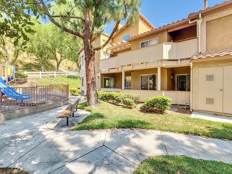 This immaculate turnkey condo is located in the prestigious "The Hills" surrounded by lush verdant landscaping! Beautiful Wood Laminate Flooring, Spacious Living Room with Vaulted Ceilings and a Cozy Fireplace. Loverly Dining Room with Chandlier. Upgraded Kitchen with Granite Countertops, Stainless-Steele Appliances and Recessed Lightings. Plenty of spaces of kitchen cabinets to store all of your storage needs. Master Suite with luxurious bath and a Walk-In Closet. Second Bedroom is also a good size with a Walk-In Closet. Sliding glass door provides access to the delightful patio to relax and enjoy. This End Unit offers Privacy and Quietness. Also, conveniently located near by a wonderful Playgrounds for Children. The Unit has two Reserved and Covered Carports, and Guest Parking Spaces. The Hills Community provides Two Pools, Three Spas, Tennis Court, Fitness Center and Clubhouse for Lifestyle you deserve. Easy Access to Freeways, Shopping, and Award-Winning Placentia / Yorba Linda School District.
Come and see the beautiful home you've been waiting for! * Recent Price Reduction * Must see to appreciate!