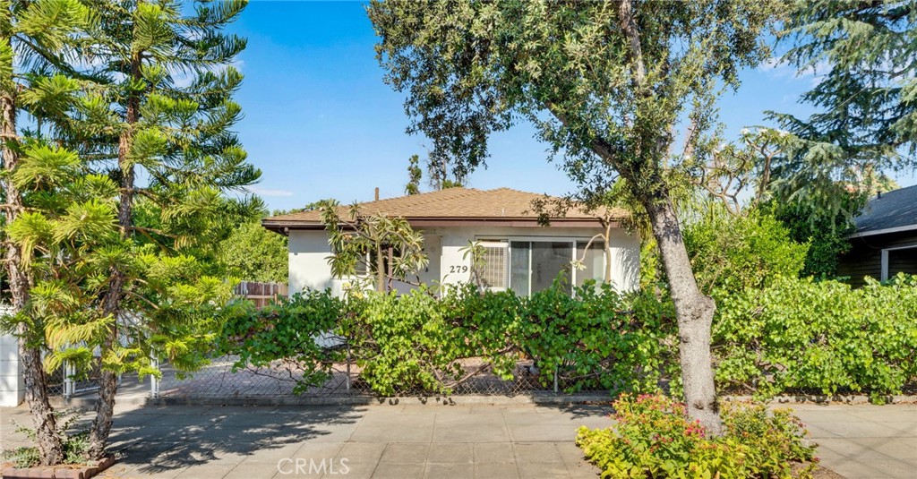 Great opportunity to buy a family home in Upland, centrally located near the 10 freeway, shops, services and close proximity to Upland High. This property features 4 bedrooms 2 bathrooms and other bonus areas suitiable for a variety of needs such as a workshop, home based business or hobbies. Both of the bathrooms have been recently updated along with newer kitchen appliances, this home is ready for your final personal touches and is primed for an ADU in the rear. Previously detached garage has been converted to a bonus room with separate entrance and alley access; a great opportunity for multigenerational families or potentially rent it to offset costs of payment after adding kitchen and bath. Affordably price Upland home with access to all of the benefits that Upland has to offer your family. The yard features low maintenance concrete and brick side yards with mature landscaping, tropical plants and fruit bearing trees.