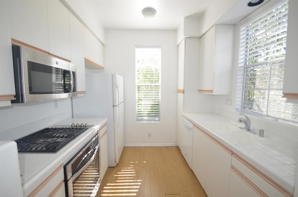 Welcome to this spectacular rental that has been extremely taken care of over the years. New paint, new flooring, new fridge, new oven, new washer and ready for a new tenant. This unit contains many upgrades that the other units do not, most notably washer/dyer in unit, new AC unit and newer water heater. Enjoy an oversized private patio with lots of sun light and light breezes. This complex is centrally located in Carmel Valley and has easy freeway access. The complex has a full tennis court, gym, and community pool. This unit comes with 2 parking spaces one is covered right next to the unit. Tenants must complete the online application, provide first months rent and deposit.