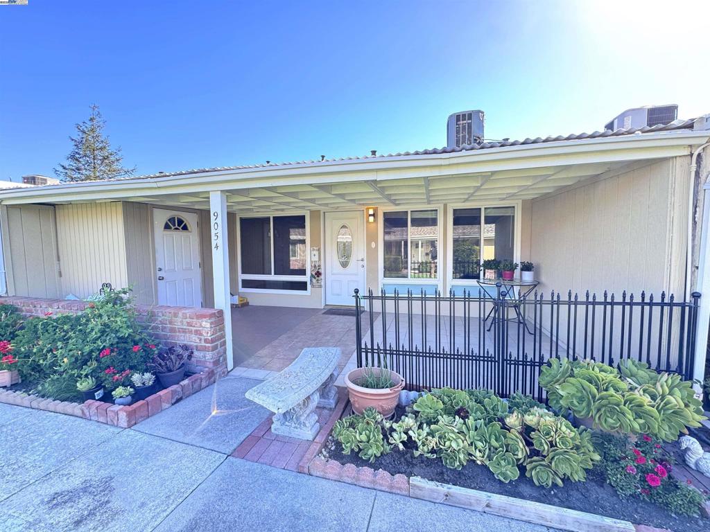 Welcome to Sunny Glen, a charming townhome in an exclusive 55+ community. This one-bedroom, one-bathroom, single-level residence is designed for both comfort and convenience. The remodeled open-concept kitchen features granite countertops, modern appliances, and classic white cabinetry—a true delight for any home chef. The bathroom has been thoughtfully updated with luxury vinyl flooring, a stylish vanity, and ample storage. Throughout the home, new vinyl flooring and fresh paint add a touch of elegance. The spacious covered patio offers a serene spot to enjoy the sunset. Practical amenities include assigned covered parking with overhead storage and plenty of visitor parking. The community clubhouse is a social hub, offering a pool, spa, bocce, shuffleboard, and a library to keep you engaged. The HOA covers free laundry, basic cable, water, sewer, and garbage services for your convenience. Ideally situated near shopping, a senior center, medical facilities, golf courses, and a fire station, Sunny Glen invites you to embrace the ideal 55+ lifestyle. Make this exquisite home your own and experience the best that life has to offer.