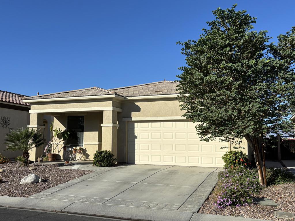 Professional photography coming soon! Popular Hideaway model that has been beautifully maintained and is offered for LONG TERM LEASE. This home features 2 bedrooms, 2 bathrooms, plus a versatile den-ideal for an office, guest room, or hobby space. An open floor plan with large windows to frame the panoramic mountain views. The chef's kitchen with island seating and full dining area makes entertaining guests a breeze. Ceramic tile flooring throughout with the exception of the bedrooms. The separate laundry room has built-in cabinets. There is a 2-car attached garage. The private backyard provides a desert retreat complete with recently updated low maintenance landscaping, a fountain and artificial grass. Located in the desirable gated 55+ community of Sun City Shadow Hills. Among the many amenities are 2 golf courses, indoor and outdoor swimming pools and spas. State-of-the-art fitness centers, tennis, bocce ball, pickle ball courts and over 50 social clubs. The home will be available after November 10th and is offered unfurnished. A pet considered upon approval. Close to shopping, dining, entertainment, casinos and a short drive to PS Airport. Easy access to I10 freeway. Don't wait to make this your new desert home!