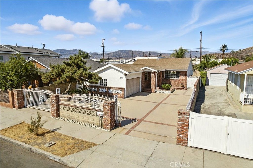 Photo of 10414 El Dorado Avenue, Pacoima, CA 91331 (MLS # BB25193290)