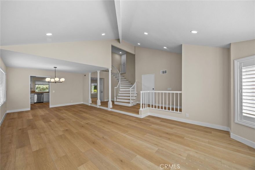 Welcome to this beautifully refreshed home located at the end of a quiet cul-de-sac just steps from the scenic Venta Spur Trail and Silkwood Park. Enjoy the convenience of walking to Brywood Elementary, Sierra Vista Middle School, and Chinese Immersion Academy (ICIA)— a highly desirable academic corridor in Irvine. Upgrades include new luxury vinyl plank flooring, fresh NEW interior paint, NEW recessed LED lighting, NEW double-paned windows & slider, ALL NEW window coverings, NEW toilets, NEW shower fixtures, & New 200 AMP Electrical Panel. The bright living room welcomes you with soaring vaulted ceilings. Open kitchen offers abundant storage and counter space and overlooks the warm, inviting family room with a fireplace & a wet bar.  A main floor BR with an adjacent half bath provides flexibility for guests, a home office, or multi-generational living.

The spacious open kitchen overlooks the family room, creating a seamless flow for everyday living and entertaining. It features freshly painted white cabinetry, recessed lighting, granite countertops, and stainless steel appliances, including a new range hood vented to the exterior. A new kitchen faucet and Reverse Osmosis (water purification) add convenience and quality. Large windows bring in natural light and frame views of the backyard, making the kitchen both functional and welcoming.

Upstairs, the primary suite is exceptionally spacious and feels like a true retreat. It comfortably accommodates a king-size bed & features its own fireplace, NEW recessed lighting, NEW ceiling fan, and a walk-in closet. The secondary BR is also notably larger than a standard bedroom, offering versatility for kids’ rooms, shared rooms, office/studio space, or a guest suite.

The backyard is truly an extension of the living space and is one of the highlights of this home. With expansive NEW stamped concrete patios, beautiful NEW green turf areas, NEW irrigation, and NEW LANDSCAPE provides the perfect backdrop for outdoor relaxing and entertaining. Host weekend BBQs, set up outdoor dining, enjoy play space, or create cozy lounge areas—the yard is generous, private, and ready to be enjoyed. The front yard also features NEW STAMPED CONCRETE, enhancing curb appeal and providing a clean, welcoming entry.

With its peaceful cul-de-sac location, refreshed interior, expansive backyard, and close access to parks, trails, and top-rated schools, this home offers the comfortable, convenient Irvine lifestyle Northwood is known for.