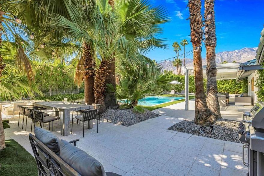 Mid-Century Polynesian Paradise in South Palm Springs; 3 Bed, 2 Bath, Updated Throughout, Private Oasis Backyard on a large lot. Welcome to your tropical retreat in the heart of South Palm Springs. This rare Mid-Century Polynesian-style gem blends vintage charm with modern upgrades, offering the perfect desert hideaway for full-time living, vacationing, or investment.Step inside and enjoy the light-filled open floor plan with thoughtfully updated interiors, while the home's distinctive architectural lines and Polynesian details preserve its mid-century character.Features Include:        Updated kitchen & bathrooms        Modern flooring, lighting, and finishes throughout        Spacious living area with seamless indoor-outdoor flow        Owned solar and energy-efficient upgrades  and improvements (see document section for full list).Entertainer's Dream Backyard:Step into your private walled oasis, designed for laid-back desert living and unforgettable gatherings:        2024 swimming pool renovation heated by solar        A covered Patio area for relaxing, a beautiful Dining space perfect for al fresco dinners,        Built-in fire pit for cozy desert nights all set in Lush landscaping & complete privacy from all sides.Whether you're lounging poolside, hosting under the stars, or soaking in the serene mountain views, this backyard delivers resort-style living at its finest. This home is truly move-in ready. Located in desirable South Palm Springs, close to golf, hiking, shopping, and dining -- all while being nestled in a quiet residential pocket.Don't miss this unique opportunity to own a piece of Palm Springs history with modern-day amenities. Check out the Video..