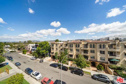 Photo of 5030 Rosewood Avenue #504, Los Angeles, CA 90004 (MLS # 26858761)