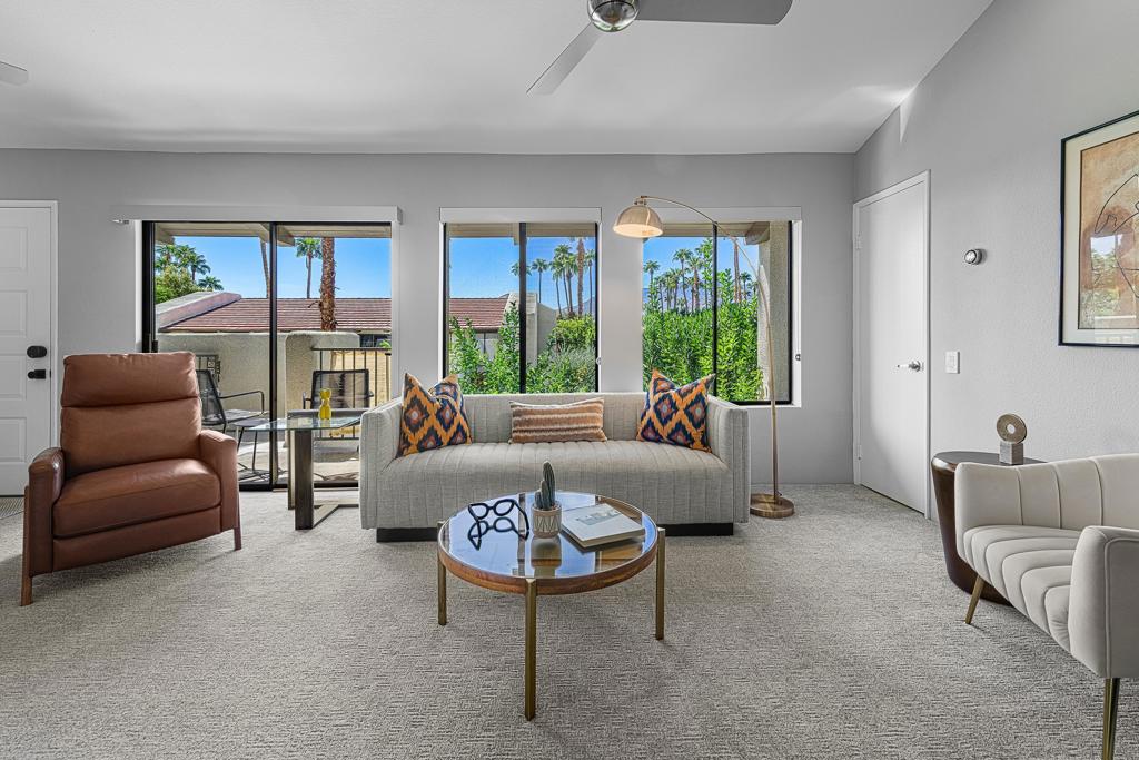 Downtown convenience, mountain majesty, and income potential define this Casa Verde condo. Offering the community's largest floor plan and some of the best vistas in the complex, this residence combines comfort with opportunity. Vaulted ceilings in the living, dining, and guest bedroom create an airy sense of space, while the primary suite features a walk-in closet and private balcony--perfect for savoring morning coffee or watching evening sunsets. Both bedrooms include en suite bathrooms, and a dedicated laundry room adds everyday ease.Casa Verde's gated grounds are rich with mature landscaping and amenities: two pools, two spas, tennis courts, a putting green, and covered parking. Just blocks from the convention center, casino, shops, dining, and nightlife, the location is as practical as it is desirable. With 30+ day rentals permitted, and bookings already in place for next year that may be honored or canceled at the buyer's discretion, this cash-generating, income-producing property is as smart an investment as it is a personal retreat.