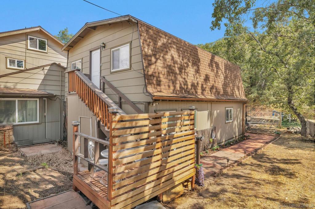 Escape to peace and privacy in this spacious, fully furnished studio apartment, just 2 miles from downtown Julian in the quiet, tree-lined Kentwood neighborhood. This 800 sq ft retreat offers a unique blend of comfort, convenience, and tranquility. Inside, you'll find hardwood floors throughout, a fully equipped kitchen with stove, refrigerator, and microwave, and a comfortable sleeping setup with a full-size bed and sleeper sofa. The updated clawfoot bathroom adds charm, while an in-unit dryer and cold-water washer provide added convenience. For year-round comfort, the unit includes electric heat and a portable A/C. A private entrance and driveway parking complete the offering. Rent includes electricity* (within reasonable usage), water, and trash service. Perfect for someone seeking a furnished, quiet rental just minutes from the historic townsite—this is a rare opportunity for secluded mountain living with all the essentials. No dogs are allowed, but an indoor cat is permitted.