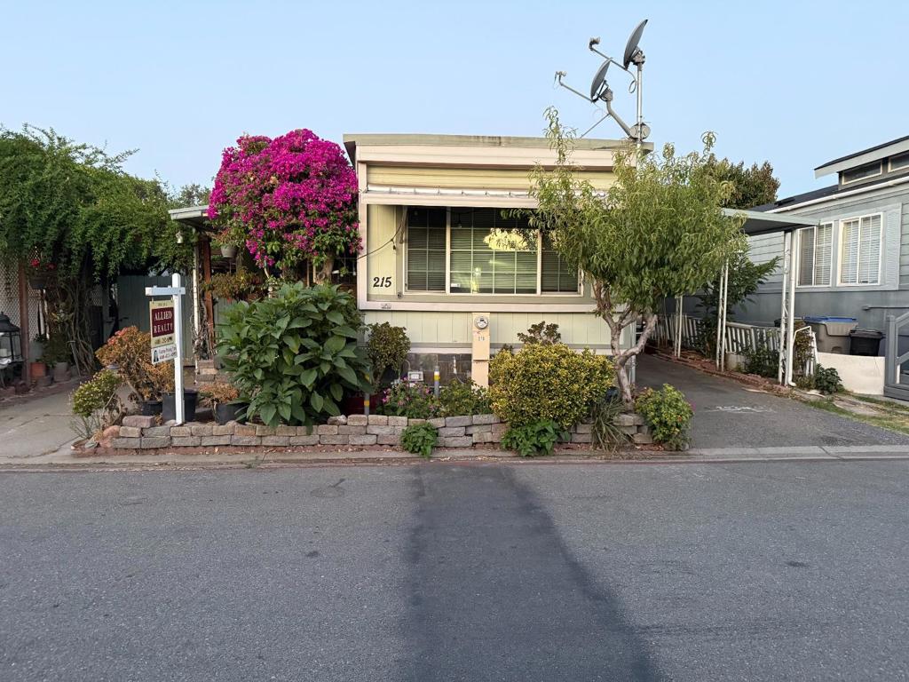 Very nice and affordable MH, huge yard with fruit trees.3 car carport. Low space rent $1,080.