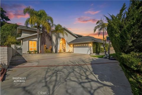 Photo of 22443 Robin Oaks Terrace, Diamond Bar, CA 91765 (MLS # PW26010098)