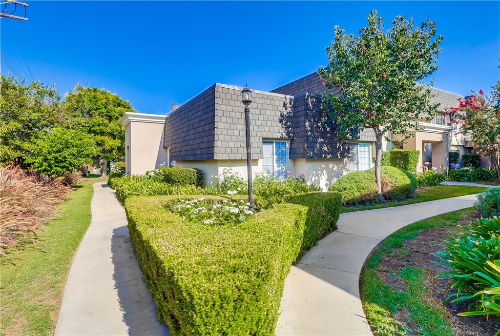 Welcome to this contemporary townhome tucked inside a resort-like community! Surrounded by lush landscaping, sparkling pool & spa, and tennis courts, this residence offers the perfect blend of comfort and convenience—all centrally located near everything you need. Step inside to a spacious, light-filled living room with smooth ceilings, fresh paint, brand new floors and an adjacent dining area. A convenient guest powder room completes the main level. The gorgeous kitchen boasts brand new kitchen cabinets, sleek quartz countertops, new appliances, large informal dining area, and sliding glass doors that open to the private patio—ideal for indoor/outdoor entertaining. The bathrooms have been completely remodeled with stylish finishes. Upstairs, the bedrooms are bright and inviting, offering great closet space and abundant natural light. The primary suite highlights, new flooring, a walk-in closet and private entry to a shared full bath. Outside, the private patio provides plenty of room for gatherings or quiet relaxation and also a 2 car private garage! With resort-style amenities and a prime central location close to shopping, dining, and transportation, this is a home you won’t want to miss!