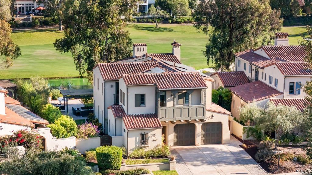 Welcome to this gorgeous home on the 4th fairway of The Crosby, an exclusive 24/7 guard-gated community. With 4 bedrooms + an oversized bonus room and boasting over 3,600 sqft of thoughtfully designed living space, this upgraded residence offers luxury, comfort, and an entertainer’s dream setting! The gourmet kitchen features a grand oversized island, high-end appliances, and designer finishes—perfect for gatherings and culinary creations. The open-concept living areas flow seamlessly to the fabulous outdoor entertaining space with ENDLESS VIEWS of the golf course, complete with a built-in BBQ, lush landscaping and ample seating. The spacious primary suite is a private retreat with a spa-inspired bath and serene views. All bedrooms include en-suite baths for ultimate privacy and convenience. Additional highlights include a formal dining area, elegant living spaces, and access to The Crosby’s world-class 18-hole golf club with a complete sports center and gourmet dining options (membership required). The Crosby is within the desirable Solana Beach Elementary and San Dieguito High School Districts.