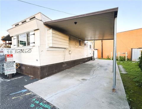 Photo of 11825 Washington Boulevard #51, Whittier, CA 90606 (MLS # DW26006200)