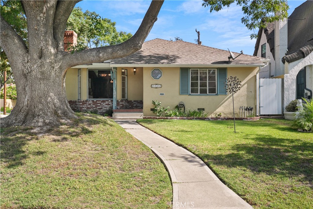 Rancho Glendale single-story ranch-style home nestled on a premier corner lot surrounded by mature, lush trees. Built in 1950, this well-kept residence has been lovingly owned by the same family for 55 years and is ready for its next chapter. The home showcases timeless original features, including hardwood floors, a classic fireplace, and an inviting indoor-outdoor flow. The detached two-car garage offers ample parking and storage, while the spacious patio is perfect for relaxing or entertaining. Enjoy the serene neighborhood setting just a short walk to local parks and Griffith Park, with convenient access to the 134 and 5 freeways. A rare opportunity in one of Glendale’s most desirable areas.