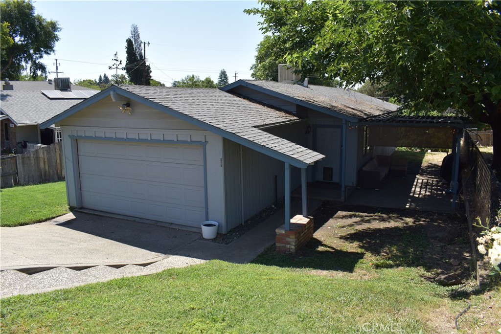 Here's your chance for a 3-bedroom 2 bath home at a great price! Seller used the First Time Home Buyer Program when this home was purchased, so it should qualify again! Seller installed all new black chain link fence along the West side of the yard and the back yard. The back yard has a large lower level great for kids to play, dogs to roam, or whatever else you might need the extra space for! There is an area between the two main levels in the yard that would make a great raised garden bed. A concrete patio on the side of the house is perfect for entertaining and barbequing. Inside you'll find an open living area between the living room and the dining area. The kitchen has all new butcher block counters and open shelving to really open up the kitchen and allow for more sunlight to come in making the space feel larger and brighter. All appliances were replaced, a new rainbird sprinkler system with all new sprinklers and the swamp cooler motor and aging parts were all replaced in 2024 as well.