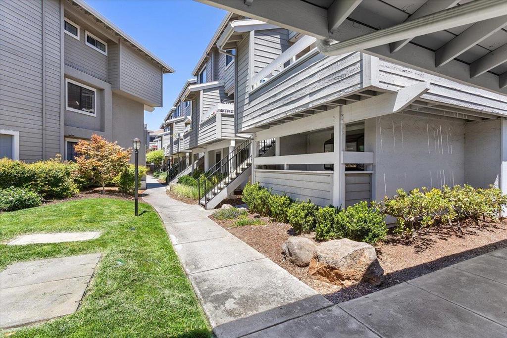*** TOP SCHOOLS, TIMELESS ELEGANCE & SUNLIT SPACES - A SOPHISTICATED SANCTUARY *** A luxuriously scaled townhome w/ abundant storage, drenched in natural light & tucked away in the back of the community w/ no neighbor on one side & lush greenery on the other * Updated kitchen w/ huge bay window, granite counters, S/S appliances, reverse osmosis, hooded vent & wooden cabinetry * Elegantly updated baths * Generous balcony w/ extra storage overlooks greenery, while the vaulted-ceiling primary suite impresses w/ its scale & oversized closet * In-unit laundry * Dual pane windows * Wooden floors * Recessed lighting * Covered garage + abundant extra parking w/ no permit needed * HOA covers water / sewer / trash / cable / pool & hot tub * Truly centrally located peaceful retreat just minutes from the pulse of Silicon Valley * Welcome home :-)