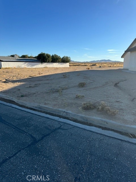 Ready to build land on paved road, nice neighorhood. Homes on both sides of the street very close to Route Sixty-Six and Fifteen freeway to commute. Not to mention the Lenwood Outlets. This won't last!!!!