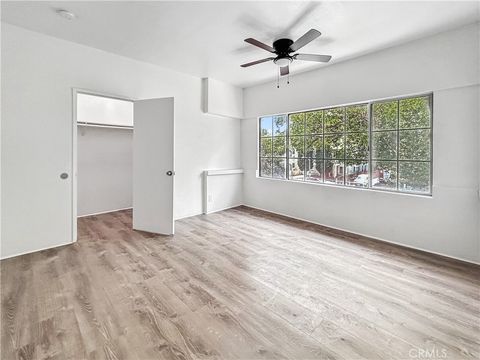 Photo of 827 W 40th #1/2, Los Angeles, CA 90037 (MLS # PV26004408)