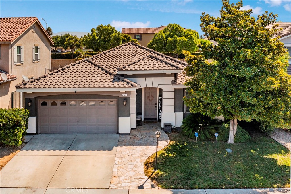 This stunning home in North Fontana is truly a gem. From the moment you walk in, you'll feel like you've stepped into a Pinterest dream. With 4 bedrooms plus an office, there is plenty of space for everyone. The ceramic tile floors throughout the house are not only stylish but also easy to maintain. Crown molding and recessed lights add a touch of elegance to every room. The hallway bathroom has been completely remodeled, and the newer exterior paint gives the home a fresh and modern look. Custom interior paint and built-in cabinets add to the charm of this home. The kitchen features beautiful cabinets with granite countertops, perfect for cooking and entertaining. The backyard is low maintenance, making it easy to relax and enjoy the outdoors. The garage includes a storage room that can be removed if desired. The master bedroom boasts a walk-in closet with built-in shelves, and ceiling fans can be found in all bedrooms. This home is not only beautiful but also smart. With a smart sprinkler system in the front and back yards, a smart A/C thermostat, and a smart garage opener, you can control your home from anywhere. The curve appeal of this home is simply stunning, making it a must-see for anyone looking for a stylish and functional space in North Fontana at a short distance from shops, schools, restaurants and the Sierra Lakes Golf Course.