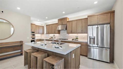 Photo of 924 Chinon, Irvine, CA 92618 (MLS # OC26057438)