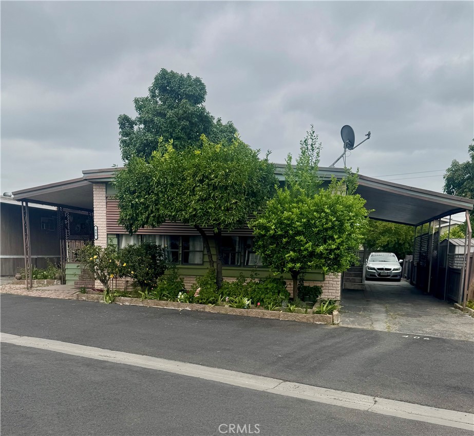 This 3-bedroom 2-bathroom Mobile Home is located in a desirable all ages community in El Monte, this home features an open floor plan with a large living room, separate dining area, separate laundry room, separate storage room, large backyard with fruit trees, Avocado tree, Pomegranate tree, Guava tree, Limes, Tangerines, and a Papaya tree. located in a well-kept community with great amenities, residents have access to a refreshing pool and barbecue grills, ideal for family gatherings and weekend fun, and kid friendly playground, also a pet friendly sitting park, conveniently situated near the 605, 60 and 10 freeways.