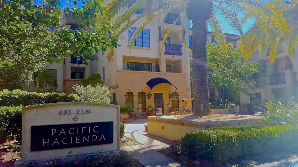 REDUCED! 2nd parking spot is available for nominal additional fee. This beautiful top floor condo in sought after Pacific Hacienda is situated in the heart of vibrant downtown San Carlos. It offers two spacious bedrooms, two bathrooms, two lovely balconies to enjoy the outdoors, granite counters and stainless steel appliances, open kitchen and dining area, remote controlled gas fireplace, ample closet space, full size in-unit washer and dryer, additional storage unit, and secure underground parking with 1 assigned space. Second parking space available to rent for additional cost. The building amenities include a beautiful lobby sitting area, fitness center, outdoor patio, elevator access and secure underground parking. No Pets. No smoking.