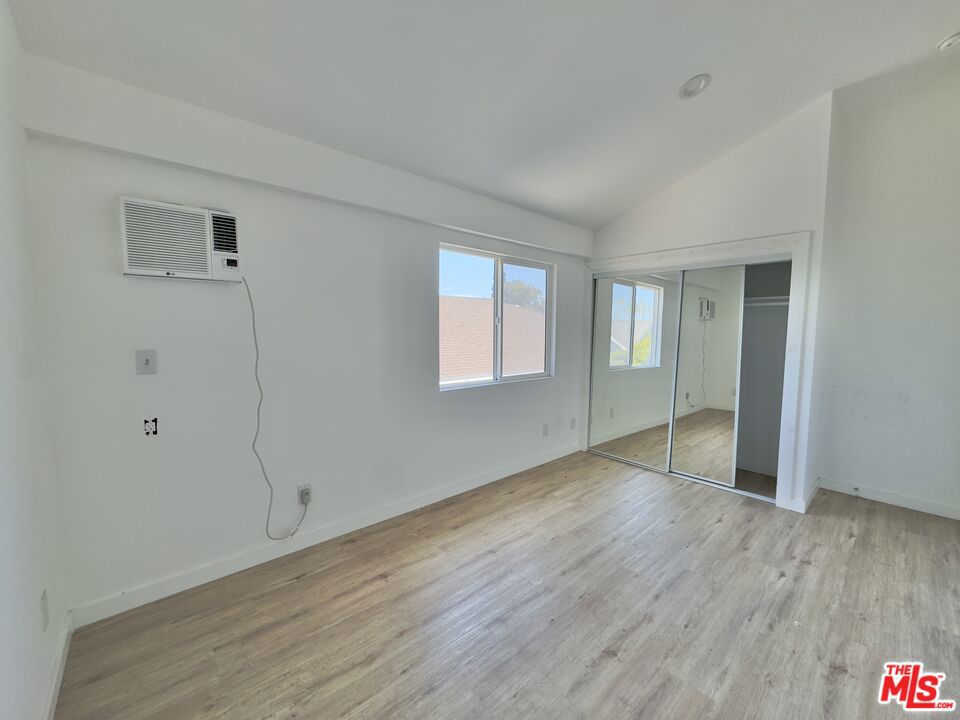 This brand-new one-bedroom apartment features a spacious layout with plenty of natural light. Enjoy the convenience of a designated parking space, an in-unit air conditioning unit, and access to an in-building laundry room. Located in a prime area, it's the perfect combination of comfort and practicality. Owner pays for water. Renter is responsible for gas and electric. Last month's rent due at signing.
