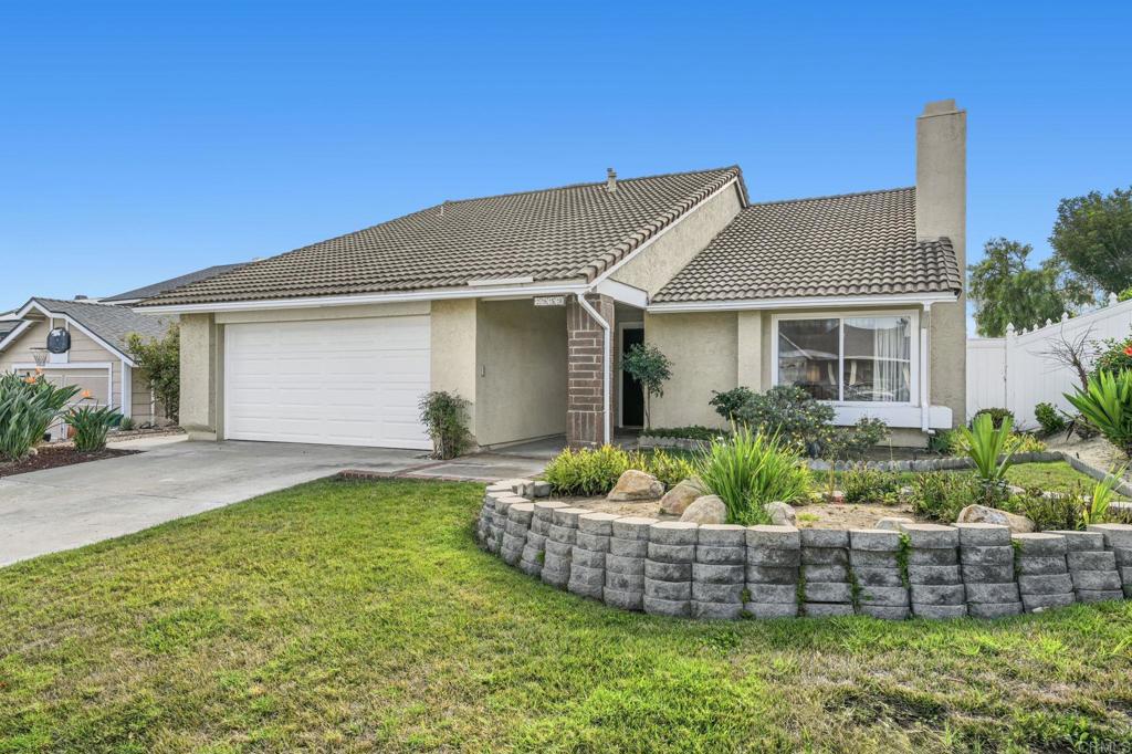 What everyone is looking for, a single story on a large cul de sac lot, no HOA fees close to 78 in Tri City. Enjoy this oversize primary bedroom (actually 2 bedrooms), kitchen opens to family area, vaulted ceilings in generous dining area, step down LR with FP. AC, dual pane windows, updated in 2024: primary bath is ADA accessible, HVAC updated 2023, new hot water heater installed 2022, washer, dryer & refrigerator convey to buyer. Covered patio, lot extends to Columbia Drive offers open privacy. Make this home your own. 4 miles to the beach, walk to Christa McAuliffe Elementary school, Mira Costa College, Sprinter, EZ access to 78, one exit to the shoppes at Carlsbad.