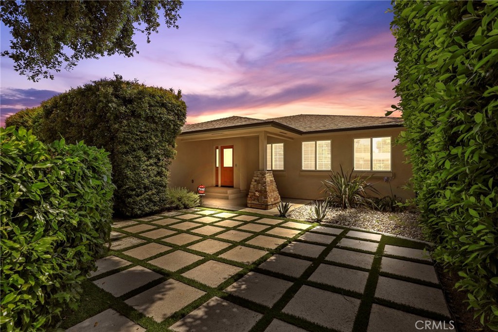 Built in 2015, this beautifully designed single-level home offers the perfect blend of contemporary style and functional comfort. With 5 spacious bedrooms and 3 full bathrooms, this residence provides ample space for large families, multigenerational living, or entertaining guests.
Step inside to an open-concept living, dining, and kitchen area that flows seamlessly together—ideal for gatherings or everyday living. The thoughtfully laid-out floor plan creates a sense of connection while also providing private retreats for relaxation. A large primary suite is privately located on its own side of the home and has plenty of closet space and a beautiful en-suite bathroom. The other bedrooms are paired with own shared hallways and bathrooms.
Enjoy your own private oasis with mature hedging in both the front and back yards, offering privacy and natural shade. The roll-up patio doors invite the outdoors in, extending your living space into a serene backyard filled with lush fruit trees - including lemon, guava and persimmon —perfect for indoor-outdoor entertaining or peaceful morning coffee.
Located in a desirable Arcadia neighborhood known for its excellent schools and community charm, 136 Sandra Ave is a rare opportunity to own a modern home with timeless appeal.
Don’t miss this turnkey gem—schedule your private showing today!