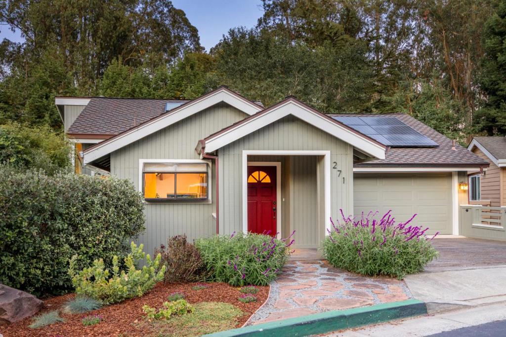 Turn-key coastal retreat in Rio Del Mar! The desirable Sumner Woods community is only a 10-minute walk to Hidden Beach via a private neighborhood trail. This move-in ready property offers vaulted open-beam ceilings, skylights, and large double-pane windows that fill the home with natural light and showcase views of nature. Beautiful red oak hardwood floors and a gas fireplace add warmth and character. The updated kitchen features granite counters, Bosch appliances, and ample storage. All bathrooms have been tastefully updated, and modern touches include designer lighting and recessed LED lights. A like-new Trex-style deck extends the living space outdoors and overlooks a beautifully landscaped, low-maintenance yard with seasonal flowers. Solar panels (owned) by Sunrun currently offset all electricity costs. Other highlights include wiring for an EV charger and hot tub. Located in a friendly neighborhood that boasts pride-of-ownership and ample guest parking. Well-managed HOA has low fees. Also conveniently located near family-favorite Hidden Beach Park, Seascape Golf Course, local tennis club, Seascape Village, and highly rated Rio Del Mar Elementary. Don't miss this rare opportunity to enjoy comfort, style, and beachside living, whether as a full-time home or coastal escape.