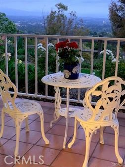 LOCATION, LOCATION, LOCATION Unobstructed panoramic view from Livingroom, dining room and patio. Highly sought after gate 14 location Villa Nueva 2BR + 2BA . This unit is on the first floor close to laundry/trash/elevator but far enough from sound and foot traffic. Smooth ceiling through out, crown moldings, recessed lighting, open kitchen w/ granite top . Bright, open, warm, comfortable... are just a few words to mention about this unit. Enjoy all the amenities, social activities the Laguna Woods community offers. This is a 55+ senior community at its best.