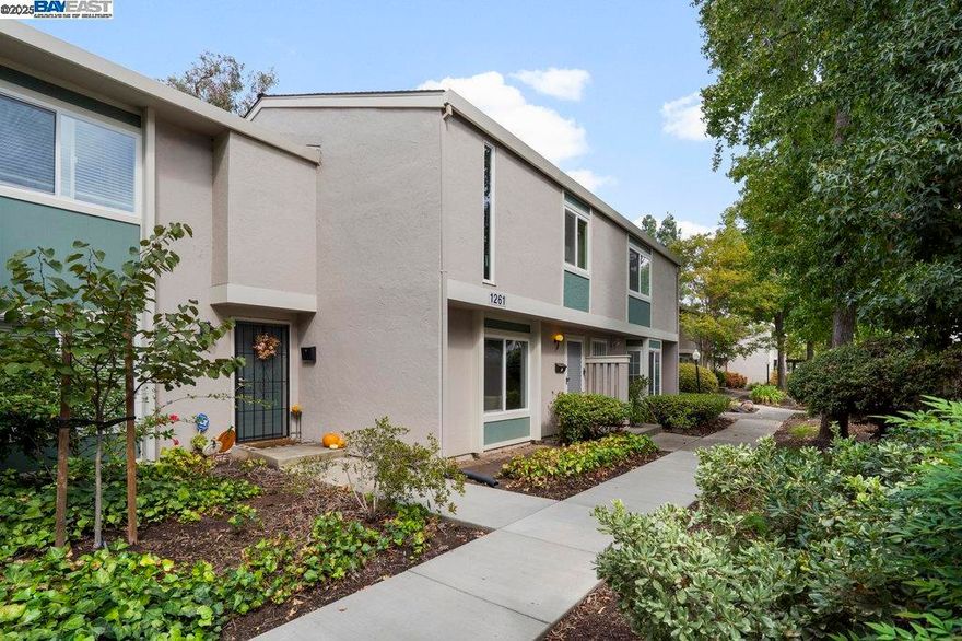Welcome to 1261-B Pine Creek Way — a freshly updated 3-bedroom, 1.5-bath home offering over 1,200 sq. ft. of comfortable living space. The interior features brand new paint and flooring throughout, creating a bright and modern feel. The spacious primary bedroom includes two large closets for ample storage.  While the kitchen and baths retain their original charm, the home offers great bones and a functional layout, ready for your personal touch. The Pine Creek community features a sparkling pool, well-maintained greenbelts, and scenic walking paths.  Conveniently located just minutes from downtown Concord, BART, shopping, restaurants, and major freeways, this property offers easy access to everything the East Bay has to offer.  A fantastic opportunity for first-time buyers or anyone looking to simplify their lifestyle!