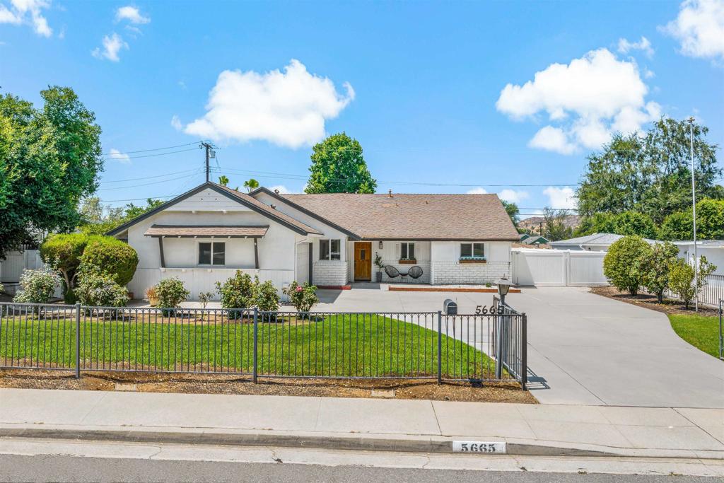 Located in the charming Cowboy Streets neighborhood of Riverside, this 3-bedroom, 2-bath home offers comfort, style, and plenty of space. The expansive sunroom serves as a year-round bonus space—perfect for relaxing, entertaining, or pursuing hobbies. The remodeled kitchen features a large island, new stainless steel appliances, recessed lighting, and plenty of storage. The living area boasts a cozy fireplace, while beautiful hardwood floors flow throughout the home. The primary bath has been tastefully updated, and all bedrooms offer nice-sized closet space. Situated on a large lot with RV parking, this home also includes a covered patio area ideal for outdoor dining or lounging. Located in a desirable neighborhood and school district, close to highways, schools, and shopping centers—and with no HOA—it’s a fantastic opportunity to enjoy both convenience and charm.