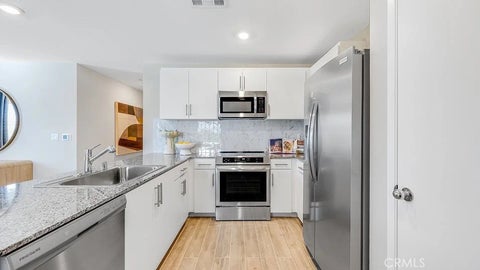 Photo of 11198 E Candle Tree Lane, Desert Hot Springs, CA 92240 (MLS # SW26123450)