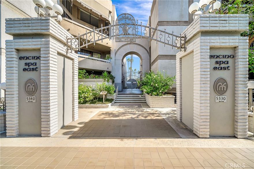 Welcome to a bright and spacious unit located in a sought-after community in a heart of Encino. The main entrance opens to a large and light living space that features neutral color hues to accommodate various design ideas, newer carpet, cozy fireplace, and large mirrored wall. Sliding doors lead to the oversized private balcony that is a perfect spot for relaxing or outdoor entertainment. Dining area is located right off the living room for an open concept feel, while the wet bar adds a touch of sophistication and makes hosting a breeze! Spacious kitchen offers appliances, lots of storage, and generous counter space. Both bedrooms are well sized, master bedroom with its own bathroom for added privacy and comfort, roomy closets, and large windows to allow plenty of light. The in-unit laundry area is also a huge plus and makes this property even more desirable. The unit is located in a quiet and well-maintained complex that is close to all the amenities and best shopping on Ventura Blvd. The community features pool, indoor spa, fitness center, recreation room, sauna, secured gated entrance, and lots of mature trees. HOA includes cold and hot water, cable, internet and earthquake insurance This property is a must see!!