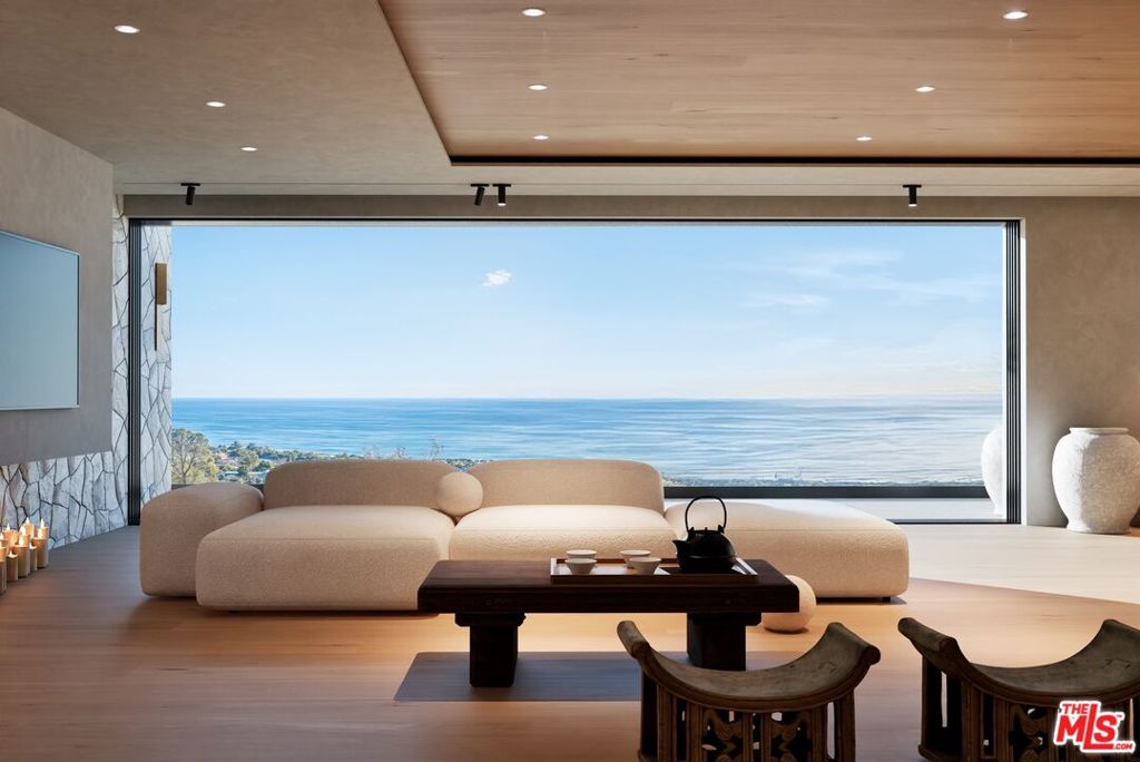 This fully permitted, ready to break ground, approximately 6,350 sq ft architectural masterpiece with 5 bedrooms, 4 full & two half bathrooms offers breathtaking 270 degree ocean views and expansive outdoor living spaces surrounding the infinity pool and spa. By acquiring this parcel, you will save hundreds of thousands in architectural costs, permitting fees, and several years of development time. Fully permitted projects of this kind on the market are rare to say the least in Malibu, cut to the front of the line and start to build your dream house today! The open-concept main floor is thoughtfully positioned on the second level, maximizing the ocean vistas and seamlessly blending indoor and outdoor spaces through large, thoughtfully placed openings. The main floor also has 2 ocean front guest suites. The upper floor has 2 spacious spacious ocean front bedrooms, including the luxurious primary suite with an oceanview bath and private outdoor terrace. The home's basement boasts over 2,200 sq ft of entertainment space, including a cinema and garage space. The home also includes an elevator for all 3 levels. Nestled on one of the most coveted streets with arguably the best ocean views and surrounded by $10 million + homes in the exclusive Malibu Park neighborhood above Zuma Beach. This neighborhood enjoys close proximity to top-rated schools, scenic hiking trails, and both Point Dume / Trancas shopping centers with several restaurants, markets, coffee shops and retail stores.
