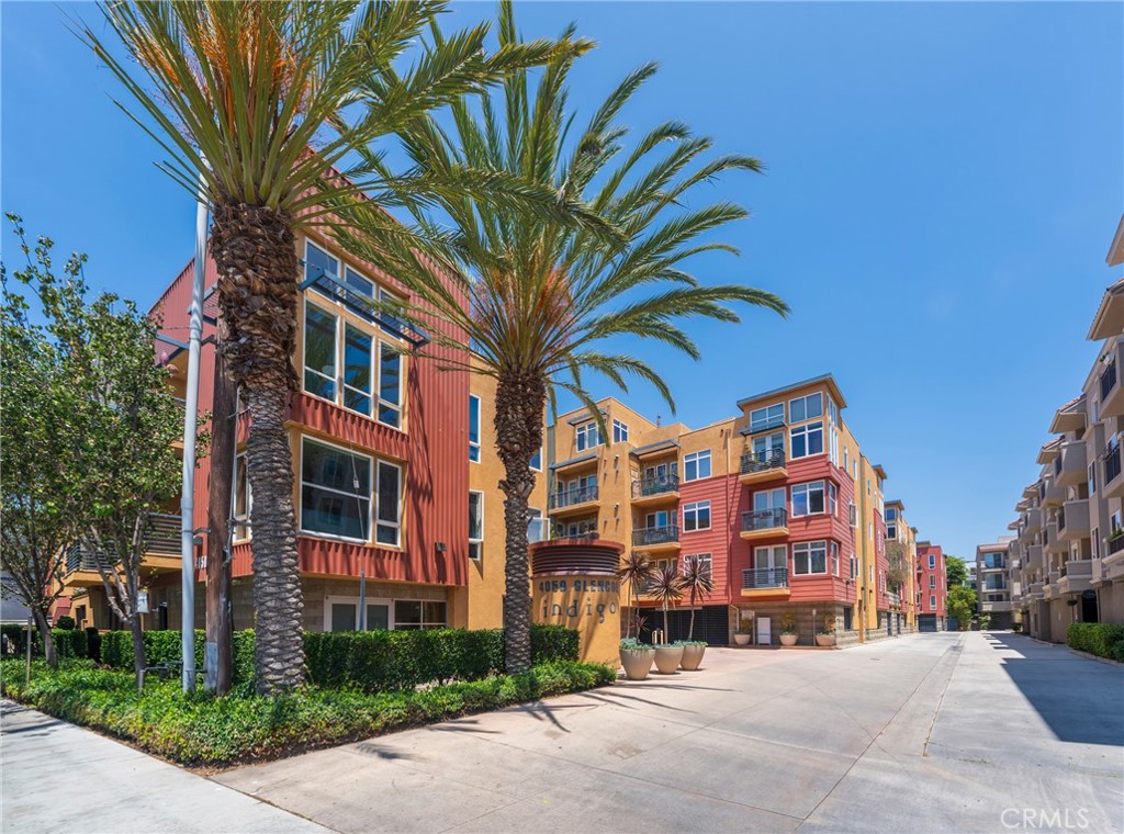Welcome to your dream home in the heart of Marina del Rey’s vibrant Arts District! This rare luxury corner penthouse of stylish living space with three bedrooms, three bathrooms, and a spacious den/office. The dramatic great room boasts soaring 20-foot ceilings, a cozy fireplace, a private balcony, and floor-to-ceiling windows that fill the space with natural light. The gourmet kitchen features granite countertops, shaker cabinets, and Viking stainless steel appliances—perfect for both everyday living and entertaining. A junior suite with walk-in closet and full bath completes the main level. Upstairs, the primary suite serves as a private retreat with multiple closets, a spa-like en-suite bathroom with dual sinks, soaking tub, and enclosed shower, while an additional bedroom with en-suite bath offers comfort and privacy. The crown jewel is the expansive private rooftop deck with panoramic city and sunset views, an ideal setting for entertaining or unwinding. Amenities include two side-by-side parking spaces, secure building access, 2-zone central HVAC, double-pane windows, and community perks such as a fitness center, spa, BBQ area, courtyard, and meeting room. Perfectly located just moments from the marina, waterfront paths, dining, shopping, and culture, this penthouse blends modern elegance with coastal convenience for a truly exceptional living experience.