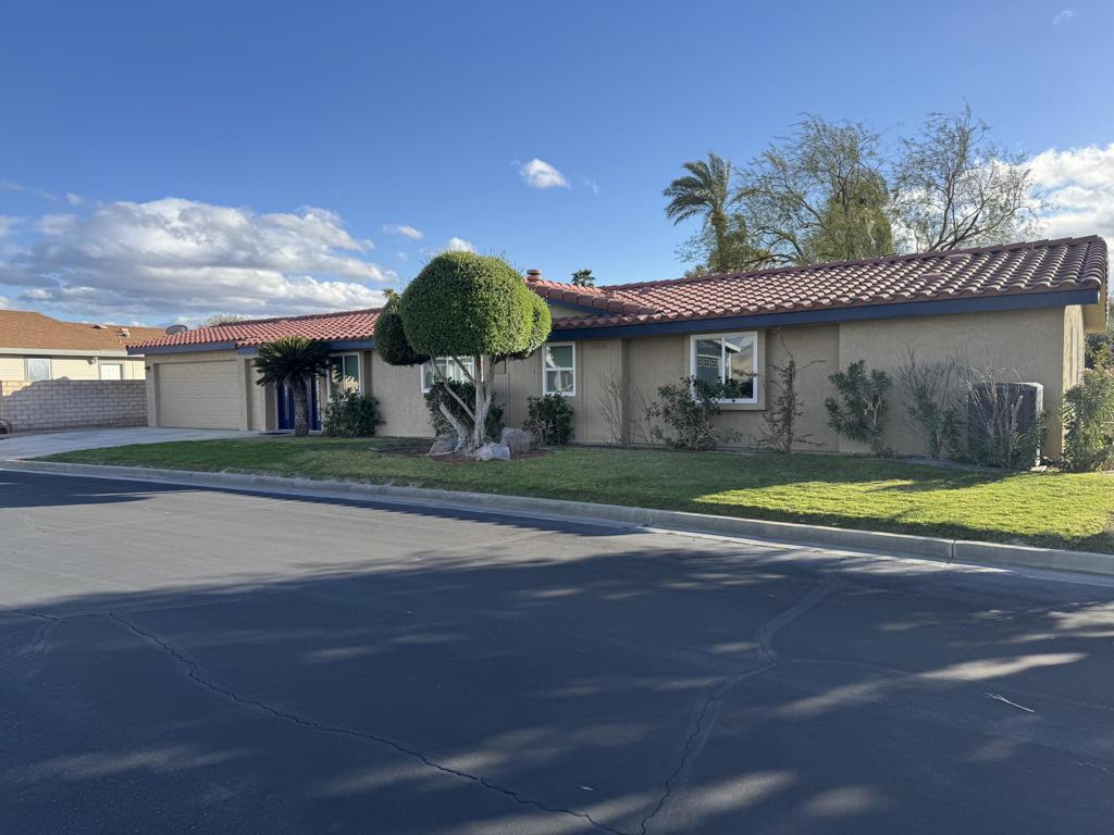 Welcome to this stunning, beautifully remodeled, Golf Course property located in the coveted 55+ community of Jack Ivey Ranch. This completely furnished, move-in-ready home offers everything you need for luxury living, including a golf cart, linens, bedding, dishes, and electronics. Set on a large, quiet 9,583 sq. ft. corner lot, this Mediterranean-style home boasts 2 bedrooms, 2 bathrooms, and a spacious office/den with a futon. This home has an open floorplan that provides ample space for both comfort and convenience. Enjoy panoramic views of the 10th Hole on the golf course, and the majestic San Jacinto and San Gorgonio Mountains from your expansive backyard patio. Inside, you'll find elegant upgrades such as new windows, fresh paint, new flooring throughout, stainless steel appliances, quartz countertops, and modern recessed lighting. With a new furnace and A/C (2022), a new water heater (2023), and a well-maintained landscape, this home is both beautiful and efficient. Located just steps away from the golf course and offering easy access to local amenities, this home is truly a gem. Don't miss the chance to own this beautifully remodeled home with breathtaking views in a peaceful and welcoming community! This home is being offered Turnkey Furnished. Ivey Ranch CC & GC, is a gated, senior community of manufactured homes integrated with a 9 hole golf course, Pro-shop, Driving Range, 4 community pools, 2 community spas, Club House and a Seasonal Restaurant. In Ivey Ranch you own the land.