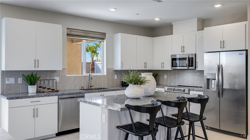 NEW CONSTRUCTION! Ready for Quick Move-in! Includes Upgraded Flooring! This new two-story home is host to a spacious and flexible open-concept layout on the first floor, with a nearby covered patio offering seamless outdoor entertainment and leisure. A secondary bedroom is tucked away into a private rear corner near a full-sized bathroom. A versatile loft is located at the top of the stairs near two additional secondary bedrooms and the luxurious owner’s suite. The kitchen features new caledonia granite countertops and white cabinetry.
Ara is a new collection of brand-new single-family homes for sale at the Skyborne masterplan, coming soon to Desert Hot Springs, CA. The community features fantastic onsite amenities with the added benefit of a low-HOA, perfect for first-time homebuyers. Nearby cities offer plenty of options for shopping, dining and entertainment, with trendy Palm Springs being just 10 minutes away. Nature lovers will love being just an hour’s drive from the world-famous Joshua Tree National Park.