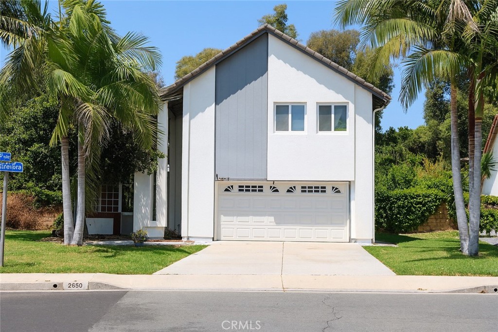 Charming and updated, this 4 bedroom and 2.5 bath home is located in an ideal Lake Forest neighborhood. Beautifully located on a large corner lot location provides privacy and joy. Home has cathedral like ceilings and an open floorplan. Updated kitchen with stainless steel appliance, granite counter tops, updated cabinets and a gas range is a delight to any chef and opens to the dining room and family room. Tile and engineered wood flooring throughout the home. Luxurious Primary Suite has a walk in closet and ensuite bathroom. Enjoy a spacious yard for entertaining and enjoying in your outdoor activities.