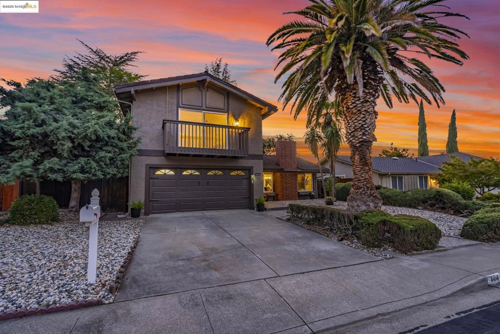 Discover your dream home! This stunning, highly sought-after residence with eastern exposure features 4 bedrooms and 2.5 baths, along with a convenient 2-car garage with remote access. Newly painted inside and out, the home is filled with natural light, creating an inviting atmosphere from the moment you step inside. Start your day enjoying serene views from the primary suite's charming balcony, perfect for basking in breathtaking sunrises. The eastern exposure ensures warmth and brightness in the mornings. Beautiful hardwood floors guide you through the open-concept layout, enhancing your living experience. The gourmet kitchen boasts brand-new appliances and elegant light fixtures that elevate the space. Cozy up by the fireplace on cooler evenings—ideal for family gatherings and entertaining friends. Nestled in exceptional HOA benefits, residents enjoy access to tennis courts, a swimming pool, and safe playgrounds. Scenic walking paths promote an active lifestyle. Families will appreciate nearby childcare offered by the HOA for busy schedules. This prime location provides convenient access to grocery stores and a variety of restaurants, ensuring that all your everyday necessities are within reach. Just 5 minutes from Clayton, experience exceptional living in a vibrant community!