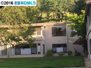 Great opportunity to customize. This is an original Monterey Model end unit located upstairs in a 4 unit Complex with Enclosure. Featuring 2 bedrooms and 2 baths. Skylights in kitchen and bathroom. Delightful park like setting. Entry 4 with carport Space 1035 #1.