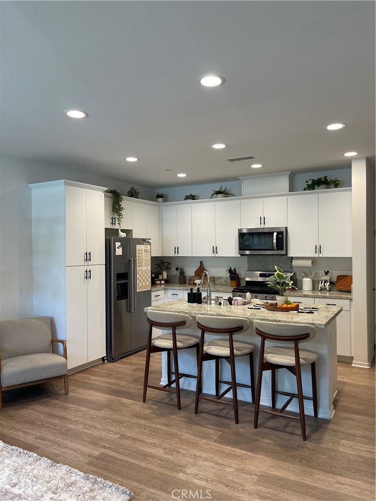 Beautiful Condominium !! 3 bedroom,2.5 bath, this property offers downstairs wood-look luxury vinyl plank flooring, new window treatment, and high ceilings. The kitchen has granite counters, an island with room for seating, and stainless steel appliances.
This home offers a leased solar system, a whole-house fan, and smart home technology !! The Parkhouse Community Center features a resort-style pool & large spa, tennis courts, a fully equipped fitness center, and much more.