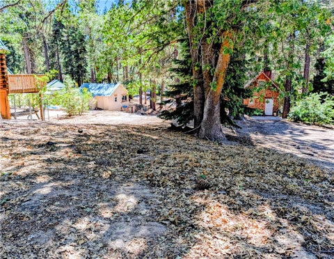 Photo of 33413 Holcomb Creek DR, Green Valley Lake, CA 92341 (MLS # IG26194156)
