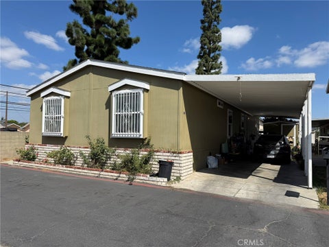 Photo of 16600 Orange AVE #25, Paramount, CA 90723 (MLS # DW26193856)